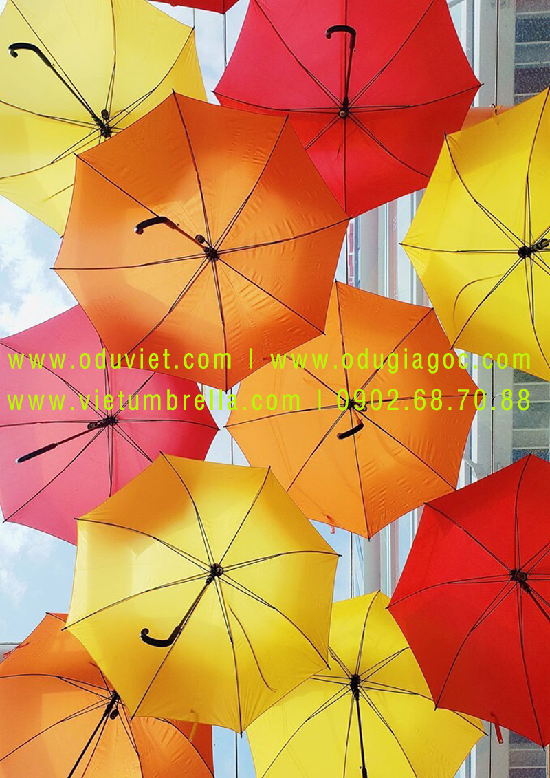 xưởng sản xuất ô dù cầm tay in logo quảng cáo